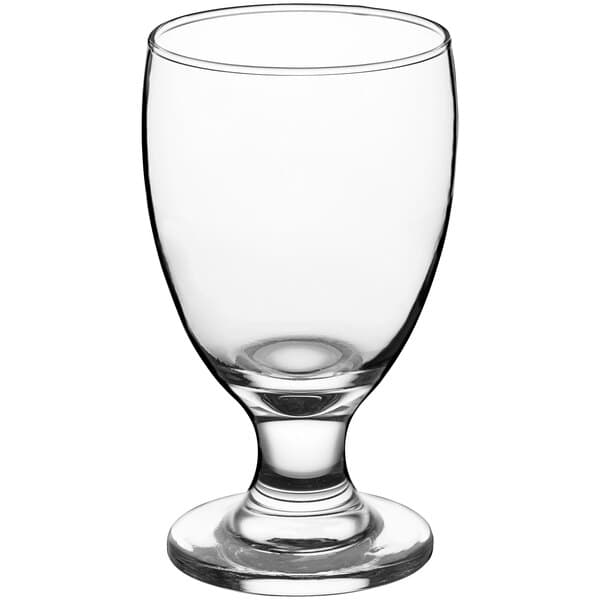 A clear glass goblet with a stem.