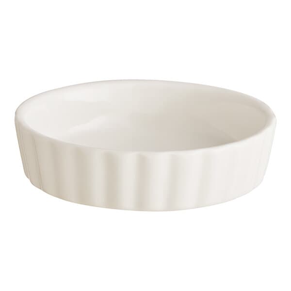 An Acopa ivory porcelain bowl with a ribbed rim.
