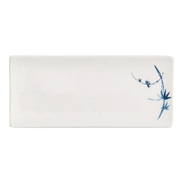 A rectangular white plate with blue designs.