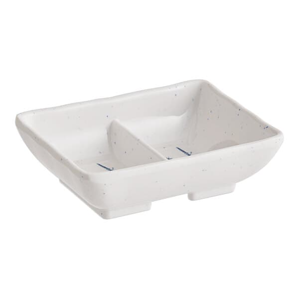 A white rectangular Acopa Biru dish with blue speckled spots.