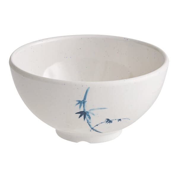 A white bowl with blue and white bamboo design.