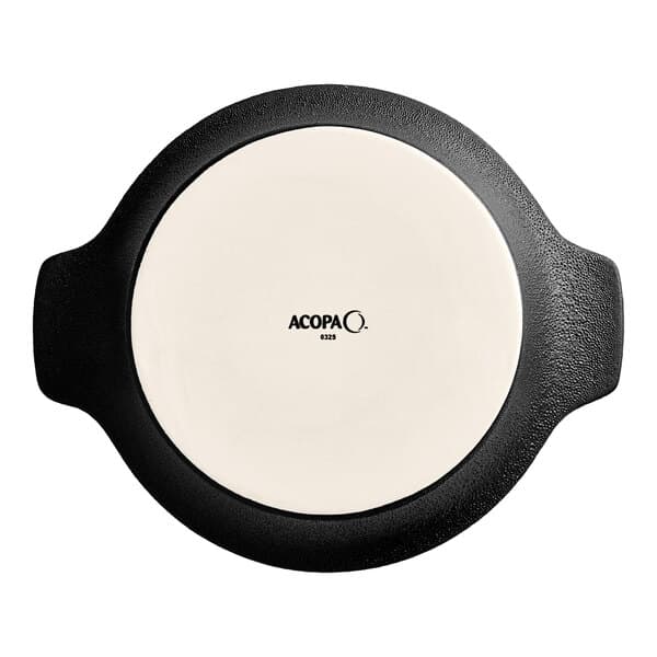 A white porcelain Acopa shirred egg casserole pan with a black and white pattern on the outside.