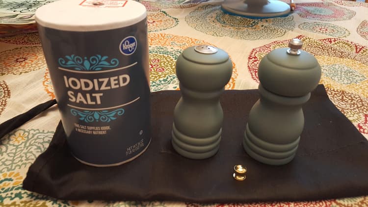 Size relative to salt container. Note gold finial option for pepper grinder.