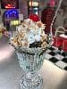 Acopa 6” spoon in a hot fudge sundae.