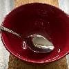 Photo of Acopa Edgeworth 7 3/4" 18/8 Stainless Steel Extra Heavy Weight Tablespoon / Serving Spoon in a bowl.