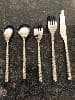 Beautiful set - substantial in weight. Design is on BOTH sides of the flatware.