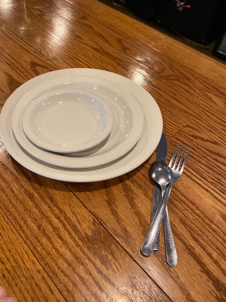 This is the small plate located on the top.