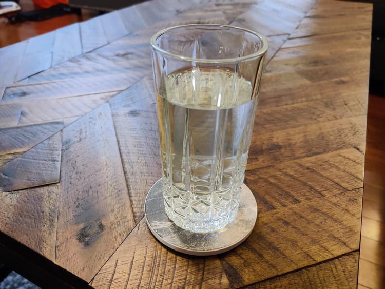 This glass is nice and heavy and looks very nice with the geometric pattern on the outside.  However, the glass and rim itself is pretty thick and not as refined as some others.