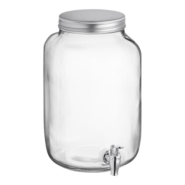 An Acopa clear glass Mason jar beverage dispenser with a silver lid.