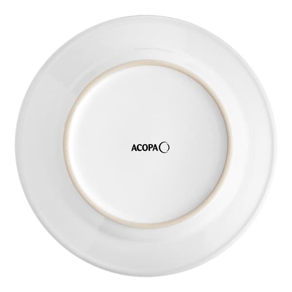 An Acopa bright white stoneware plate with a rolled edge and black text on the rim.