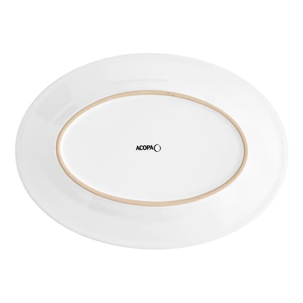A white oval Acopa stoneware platter with a brown rim.