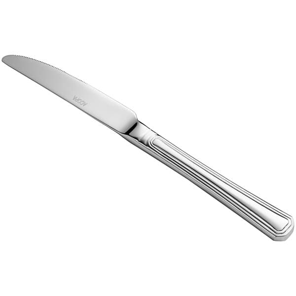 An Acopa Landsdale stainless steel dinner knife with a silver handle.