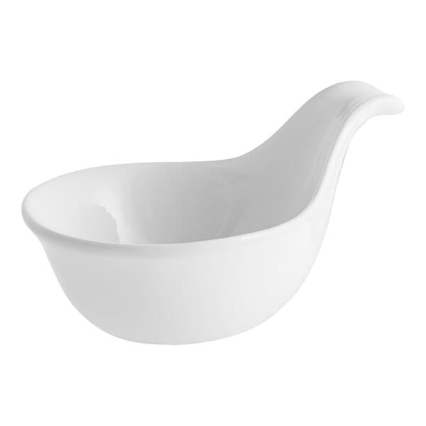 An Acopa bright white porcelain spoon with a curved handle.