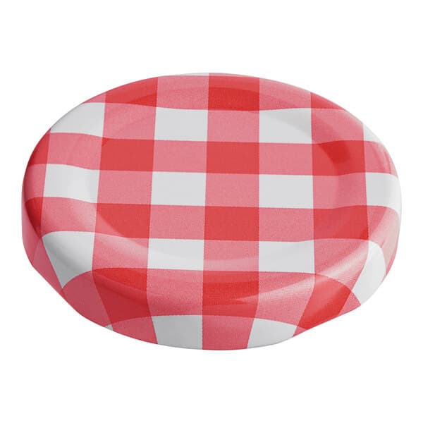 A red and white checkered Acopa milk bottle lid.