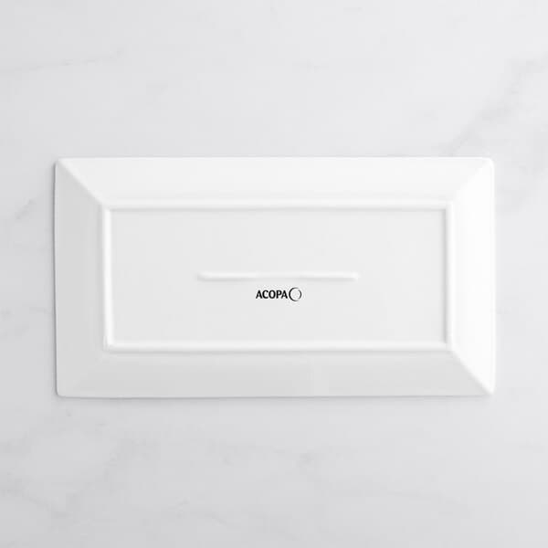 A white rectangular Acopa porcelain platter with black text that says "Jacob"