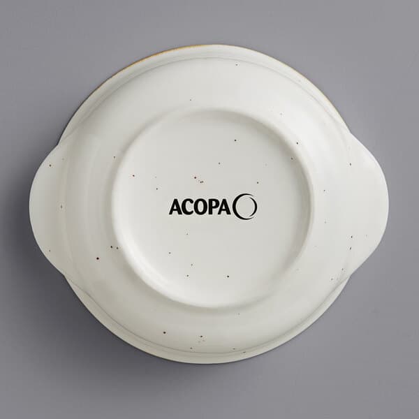 A white Acopa stoneware bowl with black text that reads "Vanilla Bean" on it.