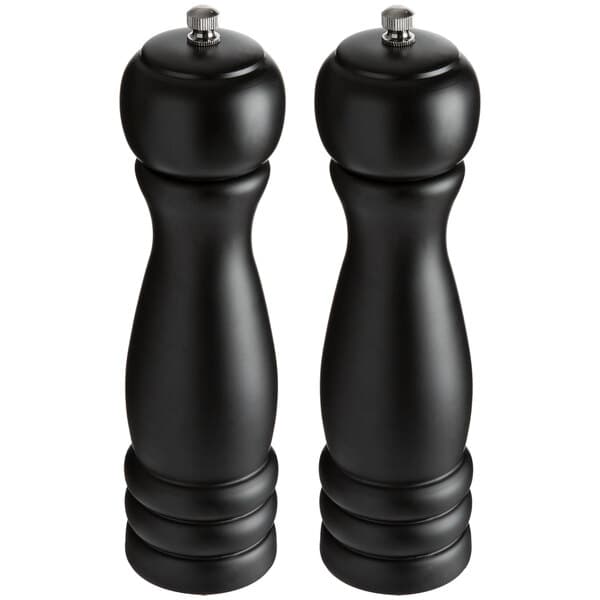 Two matte black wooden Acopa salt and pepper mills.