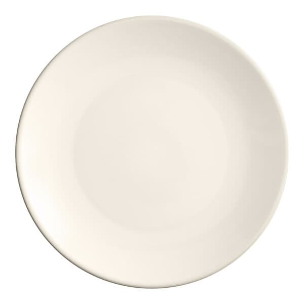 An Acopa ivory stoneware plate with a plain edge and a white rim.