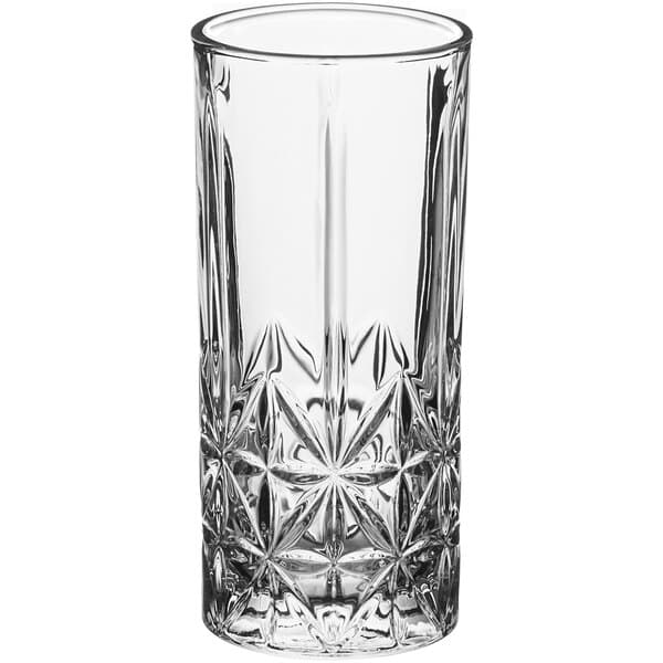 A close-up of an Acopa Gardenia highball glass with a star pattern on it.