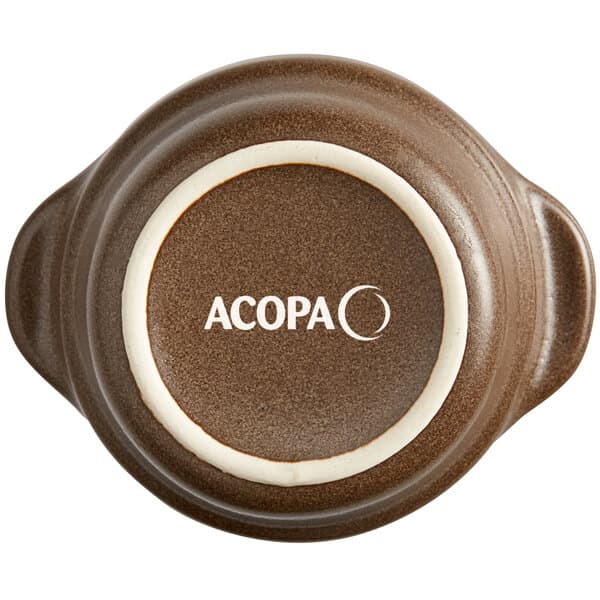 A brown stoneware sauce cup with white text that reads "Acopa" on it.
