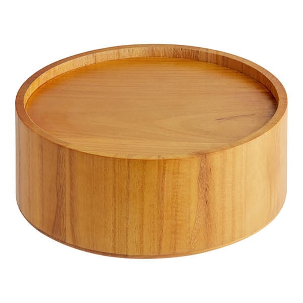 A wood base for Acopa glass beverage dispensers with a round top.