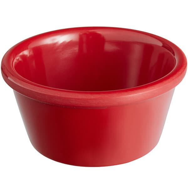 a red bowl with a white background