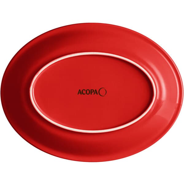An Acopa Capri passion fruit red oval stoneware coupe platter with a white border.