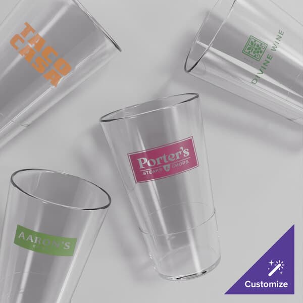 A group of Acopa Endure Tritan plastic highball glasses on a white surface.