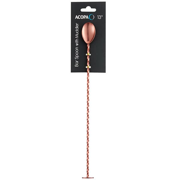 An Acopa copper bar spoon with a muddler on the end.