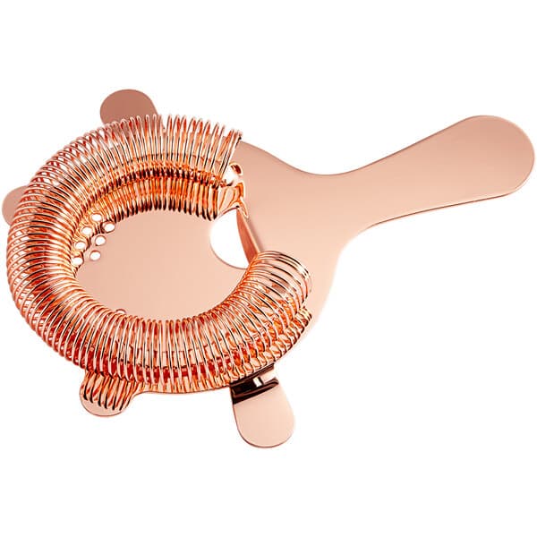 A copper bar strainer with a metal handle.