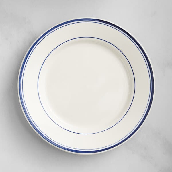 a white plate with blue lines