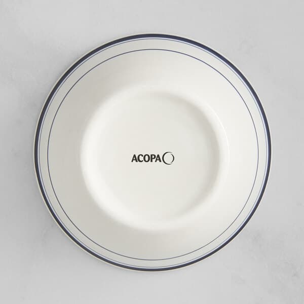 An Acopa ivory stoneware bowl with blue bands.