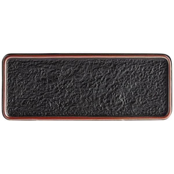 A black rectangular Acopa Heika stoneware plate with a textured surface.