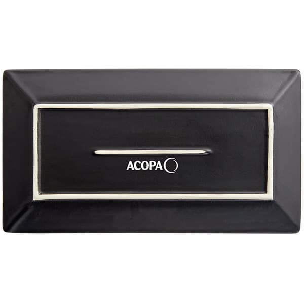 A white rectangular box with black text reading "Acopa" containing a black rectangular stoneware platter with white trim.