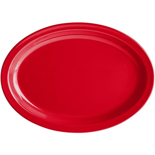 A red oval platter with a narrow rim.