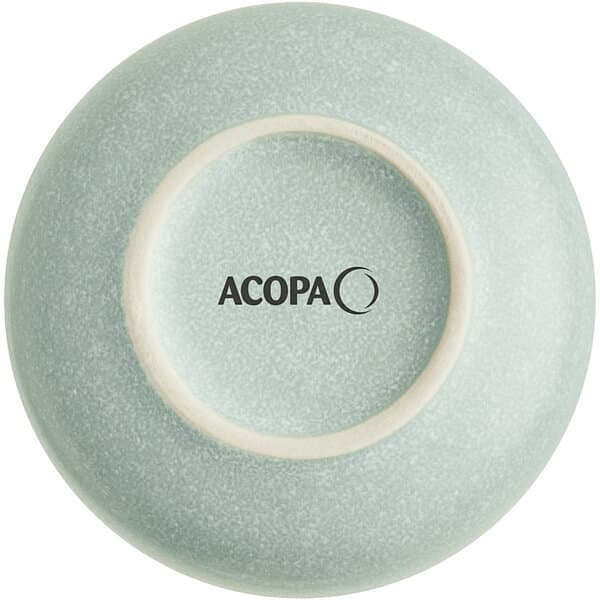 A close up of an Acopa Harbor Blue Matte porcelain ramekin with a white circle inside.