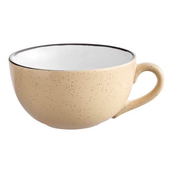 An Acopa Harvest Tan stoneware cup with a black rim.