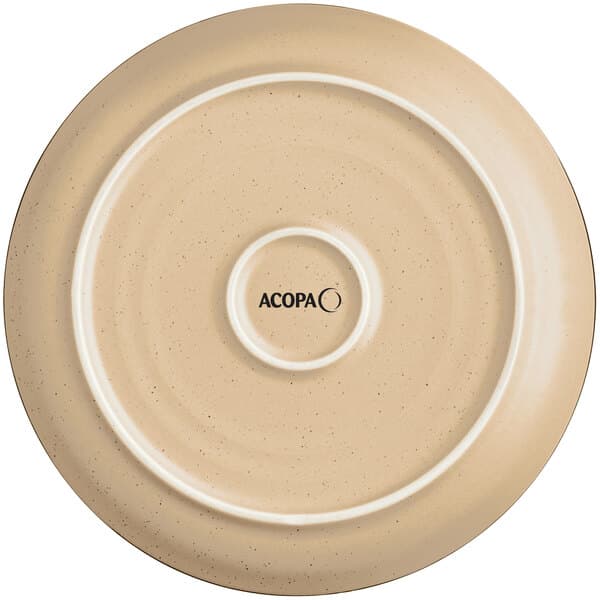 A close up of an Acopa Harvest Tan stoneware plate with a circular design.