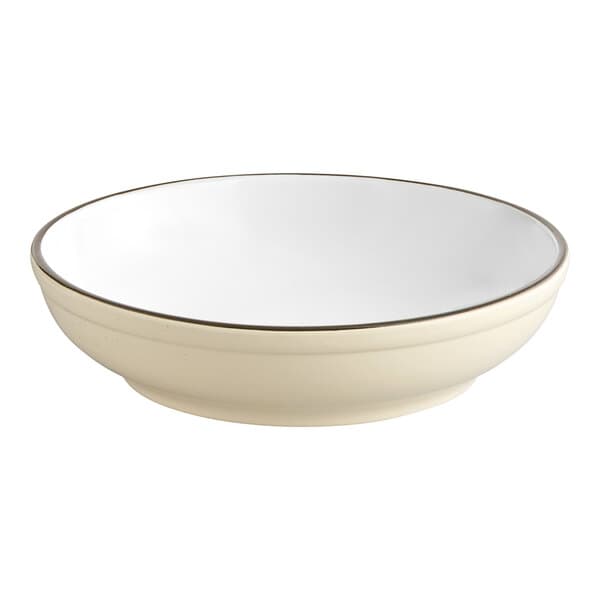 An Acopa cream white stoneware pasta bowl with a black rim.