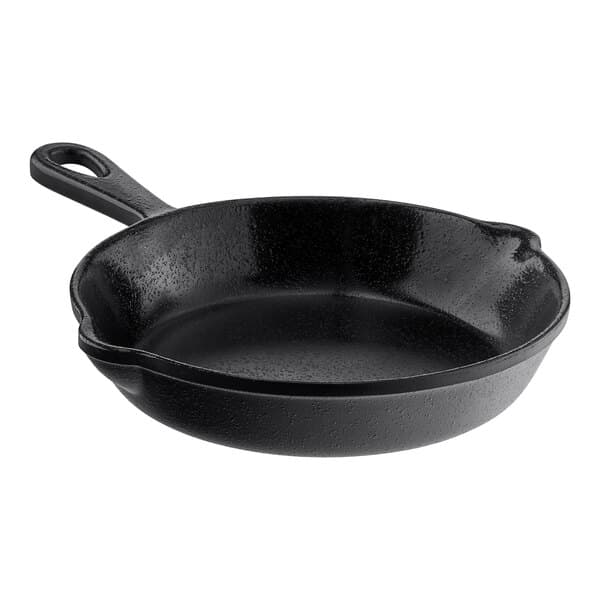 A black skillet with a handle.