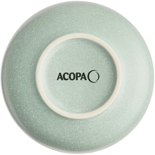 A matte blue Acopa Pangea nappie bowl.