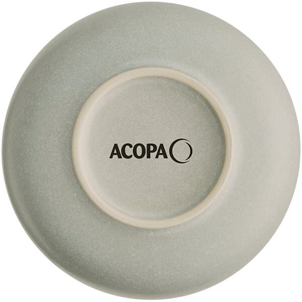 A white Acopa porcelain bowl with black text on the rim.