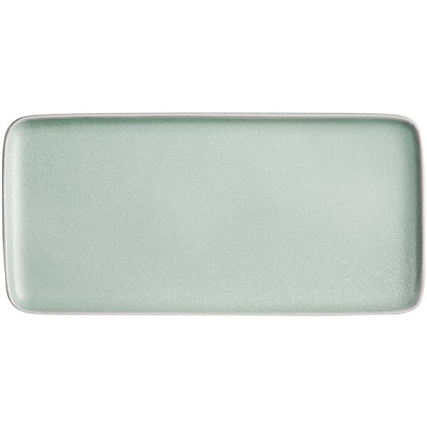 A white rectangular porcelain plate with a light blue matte finish.