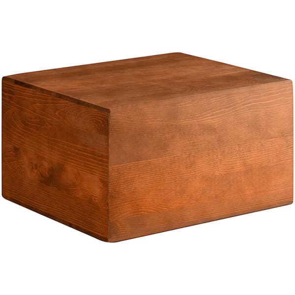 An Acopa wood display riser with a lid on top.