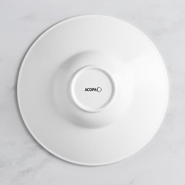 A white Acopa porcelain bowl with an embossed circle on the rim.