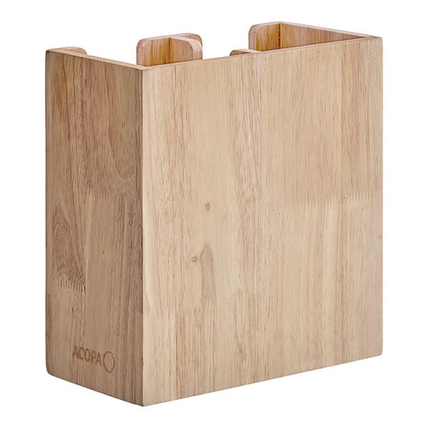 A wooden box with two sections for cups and lids on a table in a home kitchen.