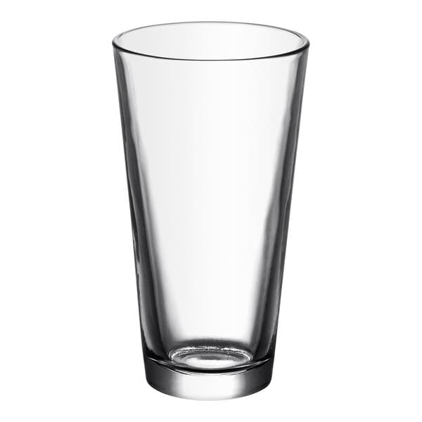 An Acopa Select mixing glass with a clear bottom.