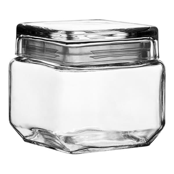 An Acopa clear glass jar with a lid.