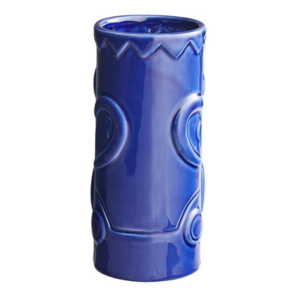 An Acopa blue ceramic Tiki mug with a pattern on it.
