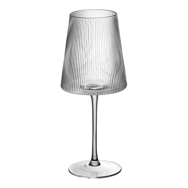 A clear Acopa Lore wine glass with a tall stem.